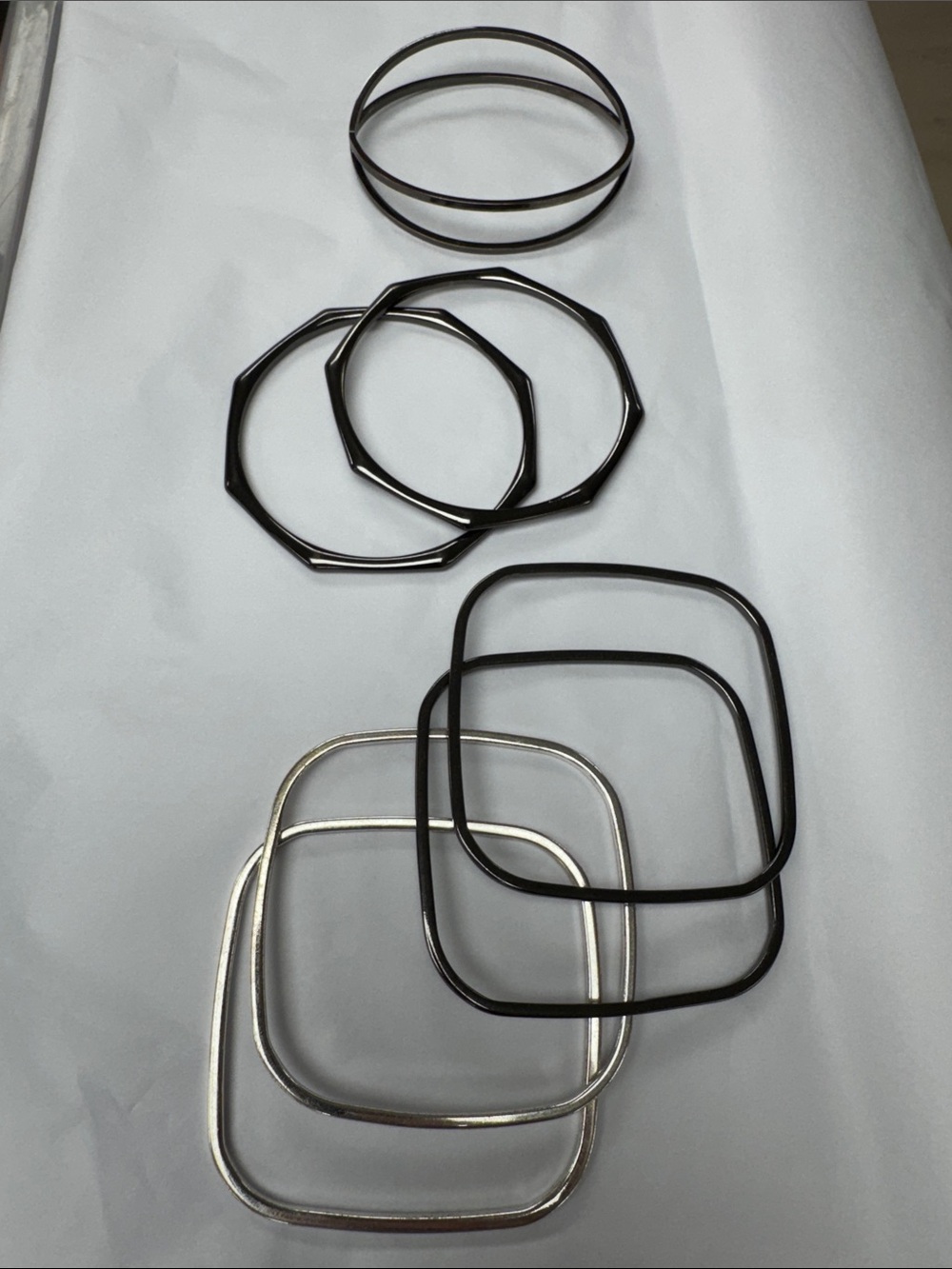 7 Black and silver square and geometric bracelets